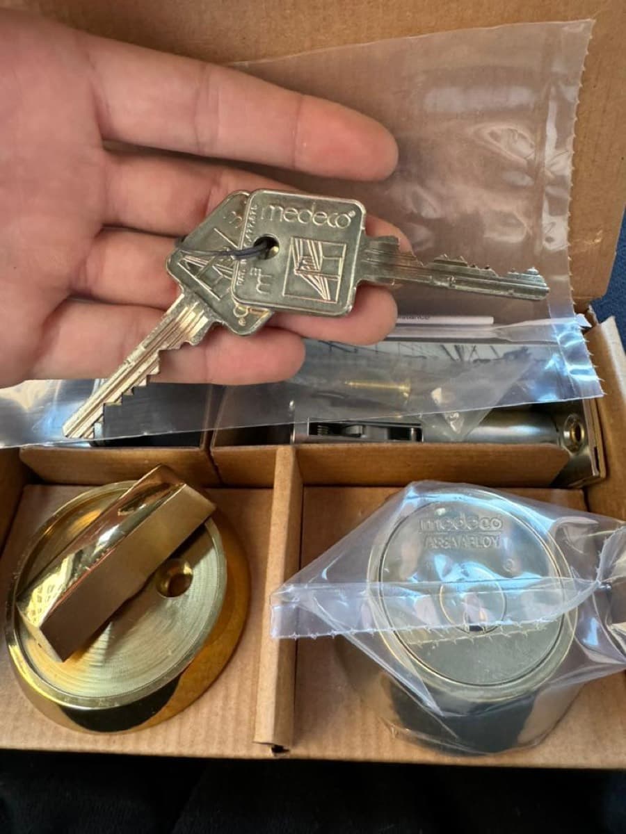Medeco high-security cylinders and restricted keys, unboxed